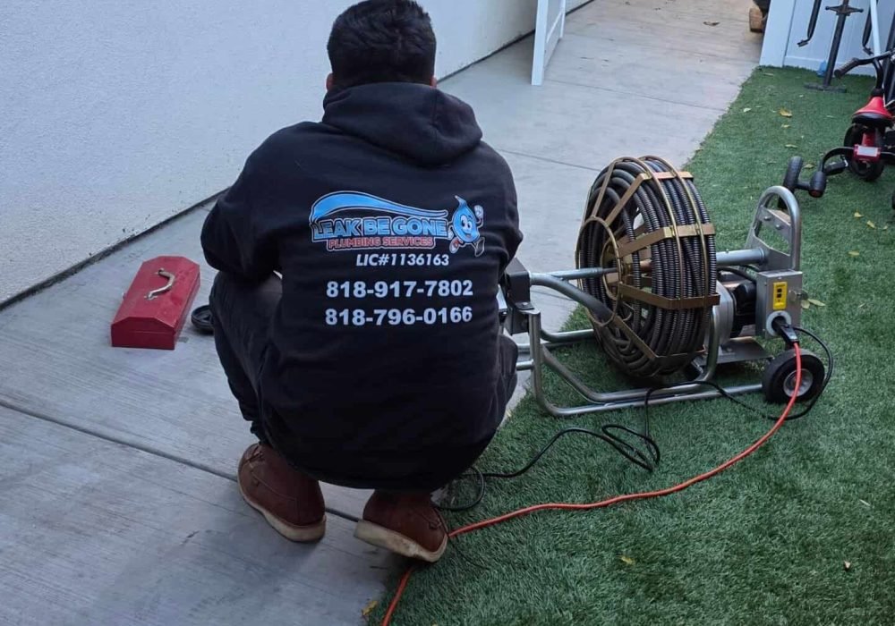 Emergency plumbing leak repair service by Leak Be Gone Plumbing. Expert technicians fixing undergrou.